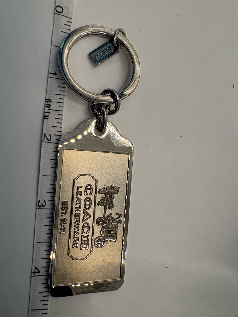 Coach EXCLUSIVE 2010 Silver Tone Leatherware Logo Key Tag